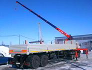 Седельный тягач-вездеход КАМАЗ-43114 с тросовым КМУ Kanglim KS 1256G-II и полуприцепом НИФАЗ